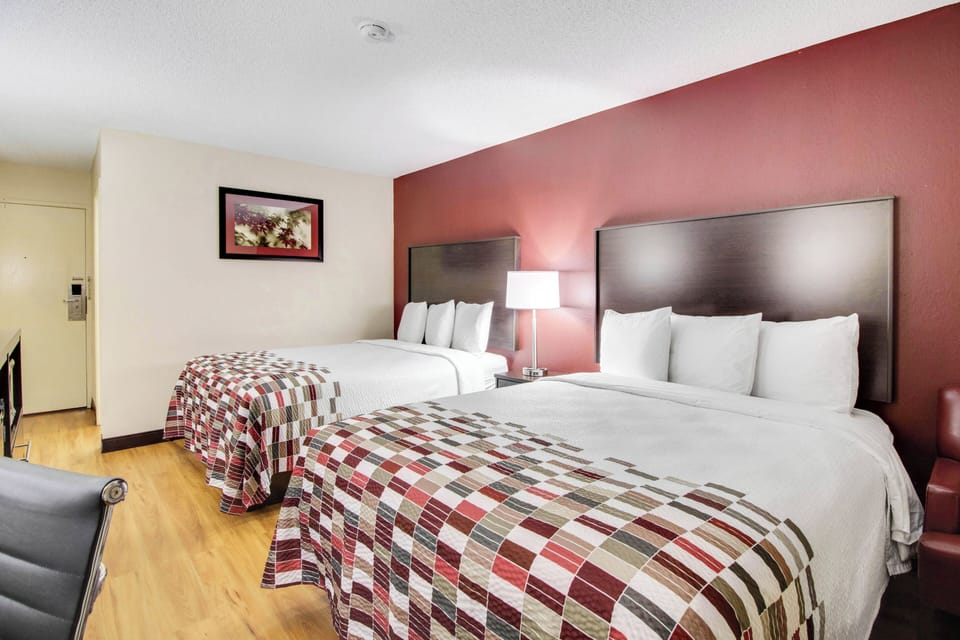 Deluxe Room, 2 Queen Beds, Non Smoking | Desk, blackout drapes, iron/ironing board, cribs (free)