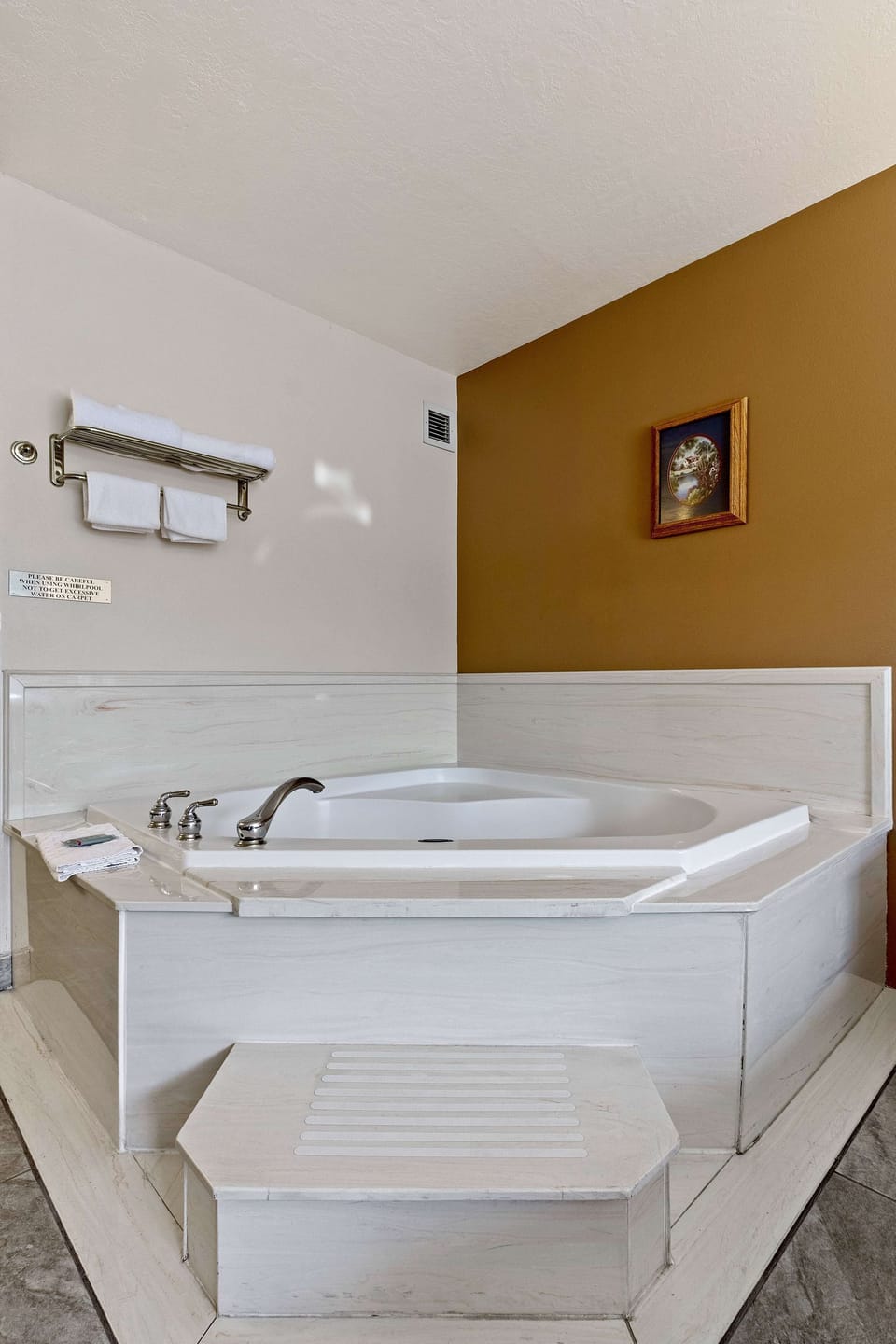 Suite, 1 King Bed, Non Smoking, Jetted Tub (Walk-in Shower) | Bathroom | Combined shower/tub, hair dryer, towels