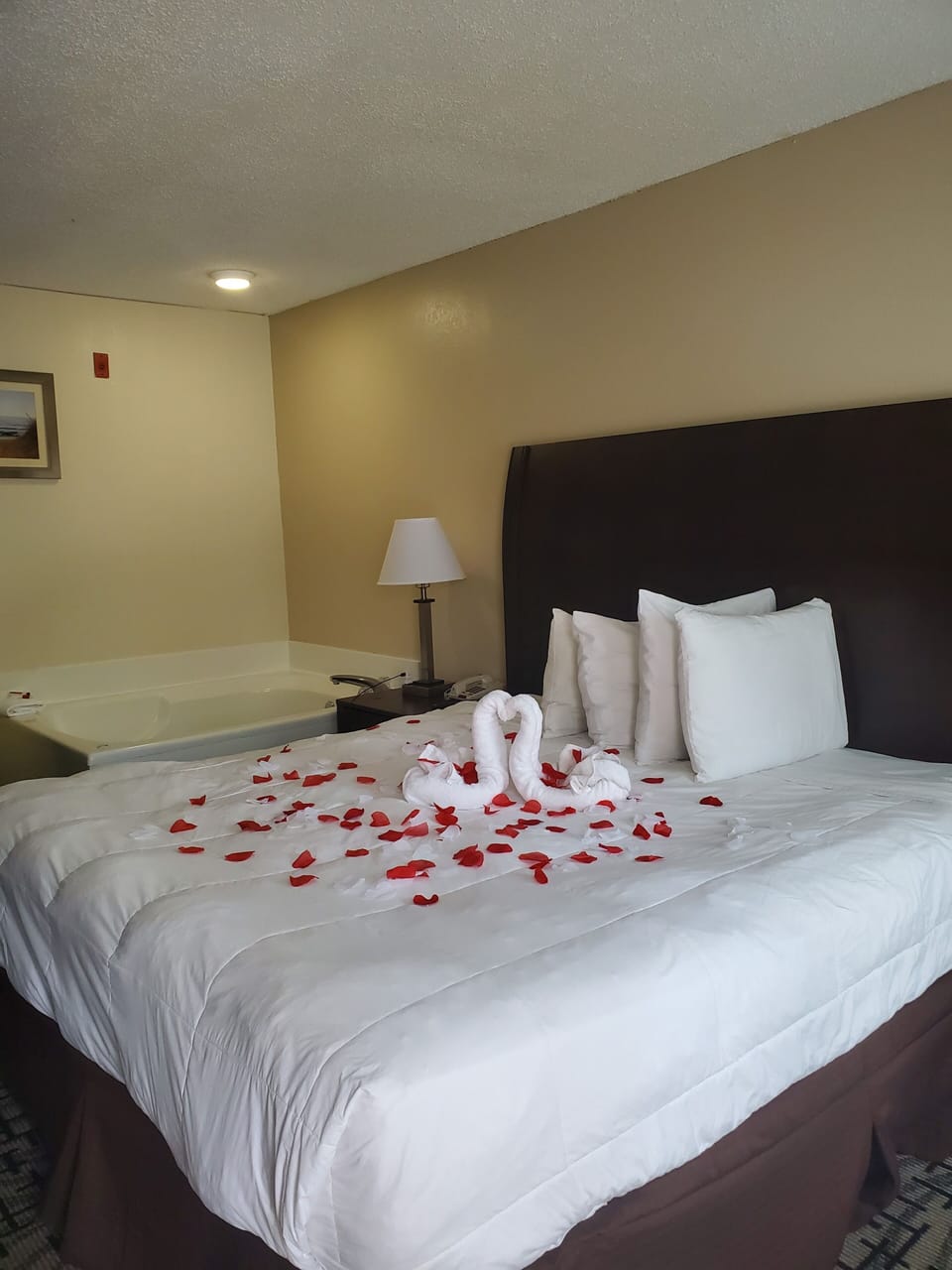 Suite, 1 King Bed, Non Smoking, Jetted Tub | Desk, laptop workspace, blackout drapes, iron/ironing board