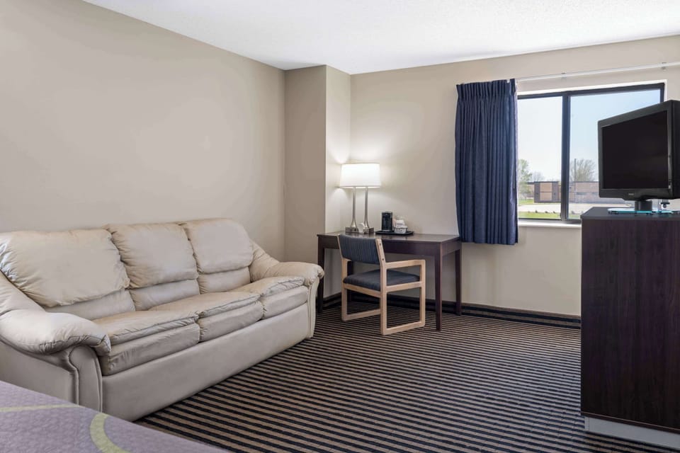 Desk, blackout drapes, iron/ironing board, cribs/infant beds