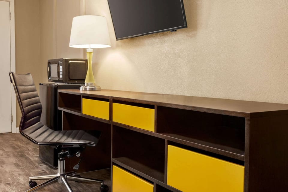 Desk, blackout drapes, soundproofing, iron/ironing board