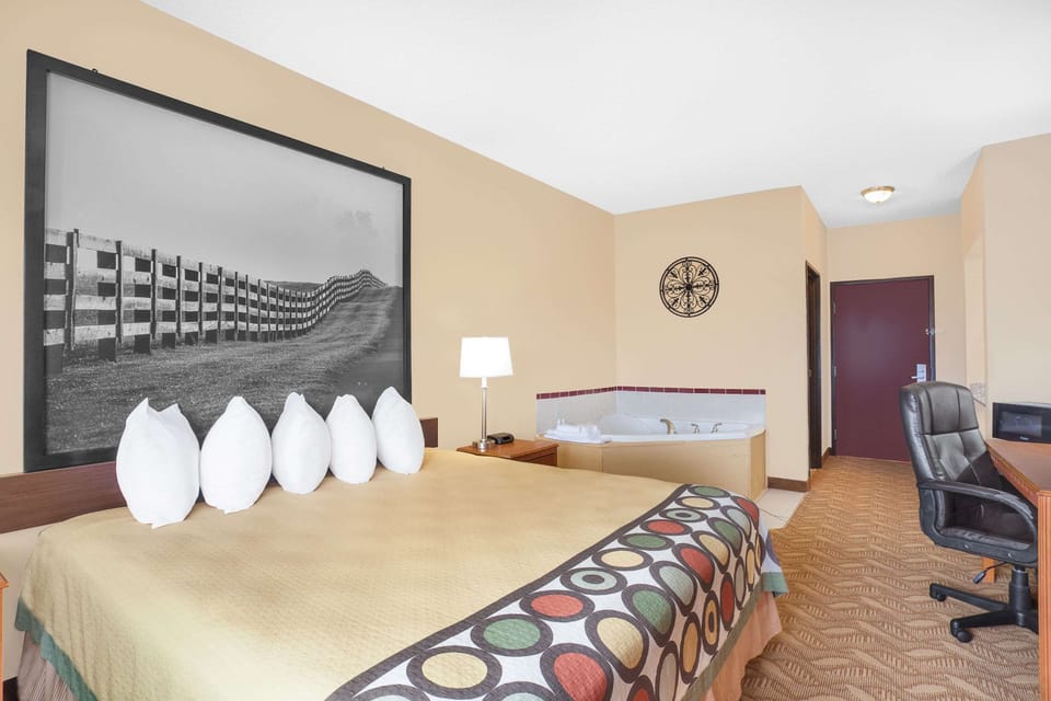 Suite, 1 King Bed | Desk, blackout drapes, iron/ironing board, rollaway beds