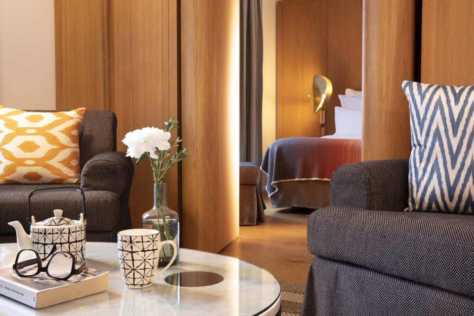 Executive Suite | Premium bedding, minibar, in-room safe, individually decorated