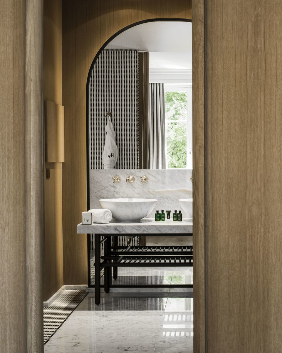 Designer toiletries, hair dryer, bathrobes, slippers