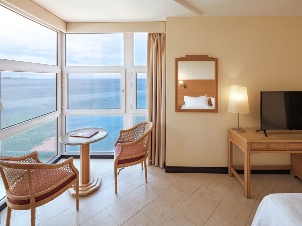 Junior Suite, Sea View | In-room safe, desk, blackout drapes, free WiFi
