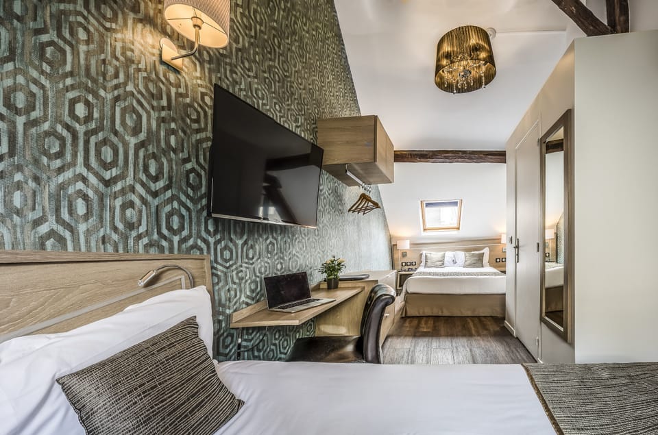 Family Suite | In-room safe, desk, blackout drapes, iron/ironing board