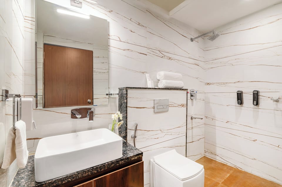 Premier Room with Sit out | Bathroom | Designer toiletries, hair dryer, slippers, bidet