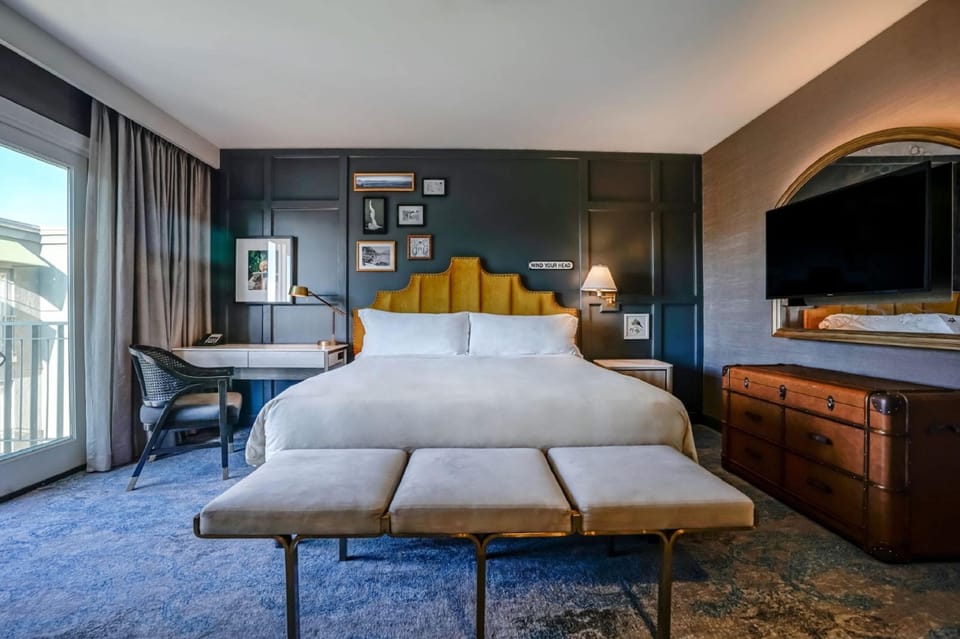 Deluxe Room, 1 King Bed, Balcony, Pool View | Premium bedding, down comforters, pillowtop beds, in-room safe