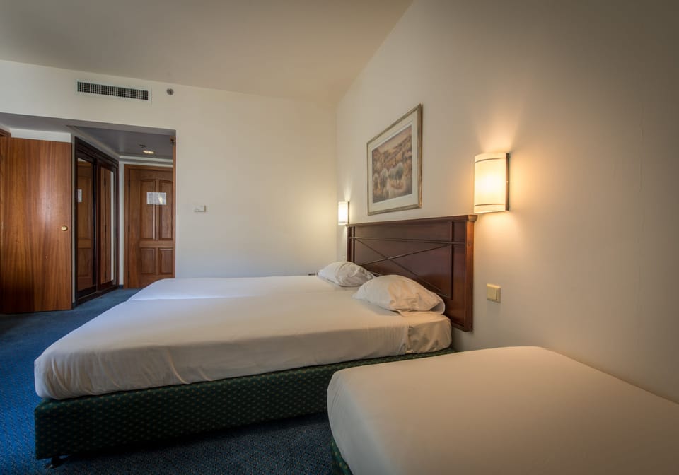 Standard Room, Patio | In-room safe, desk, cribs/infant beds, free WiFi
