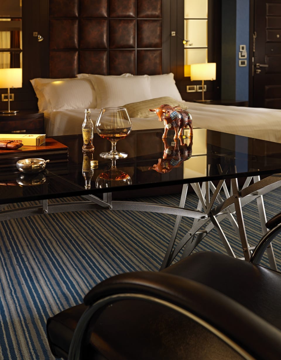 Premium bedding, down comforters, Tempur-Pedic beds, minibar
