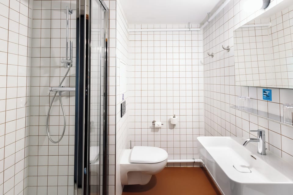 Shower, hair dryer, soap, shampoo