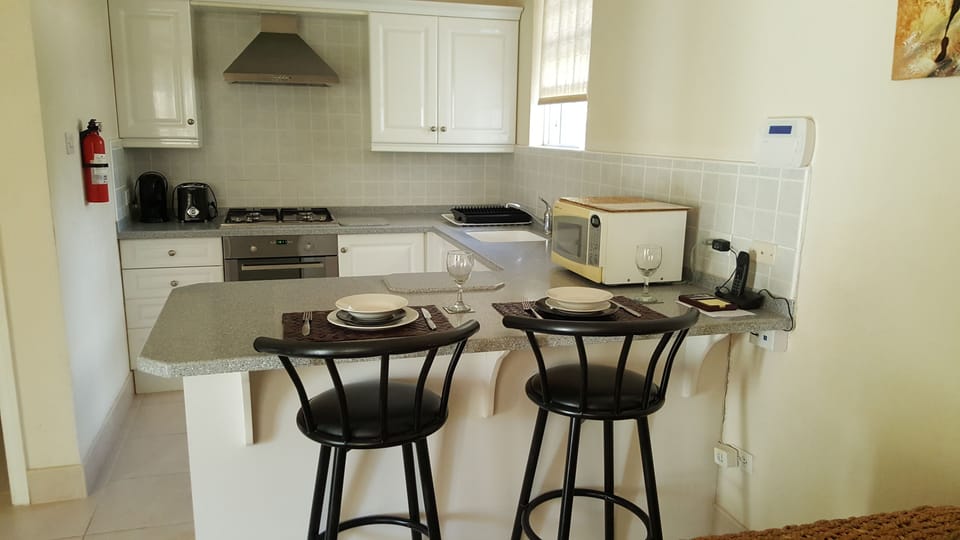 Deluxe Apartment, 1 Bedroom (Apt 6) | Private kitchen | Full-size fridge, coffee/tea maker, electric kettle