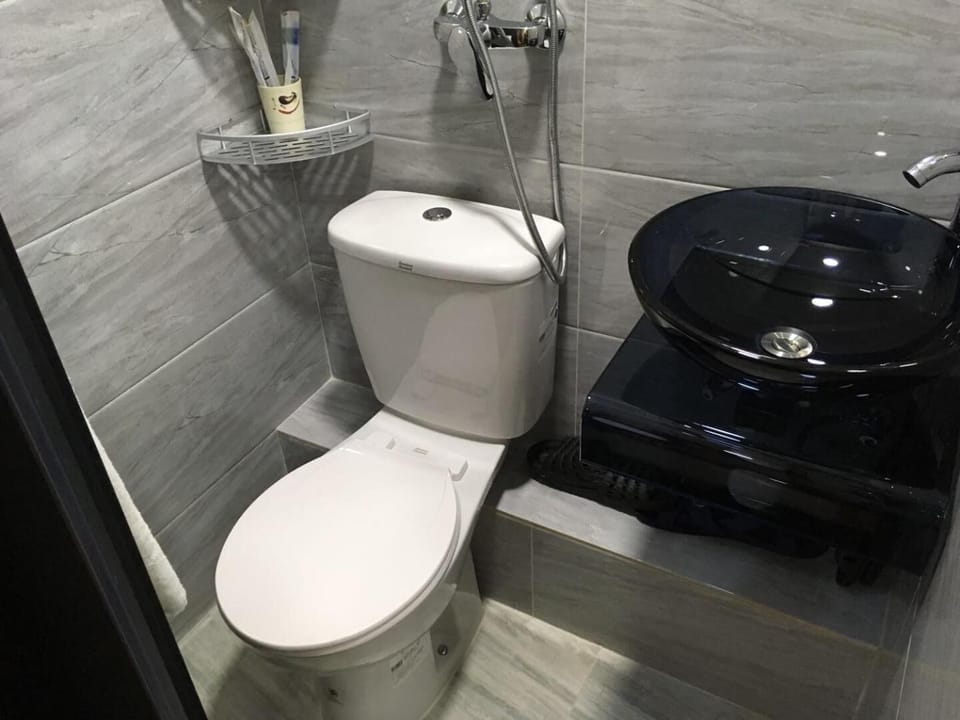 Shower, free toiletries, hair dryer, slippers