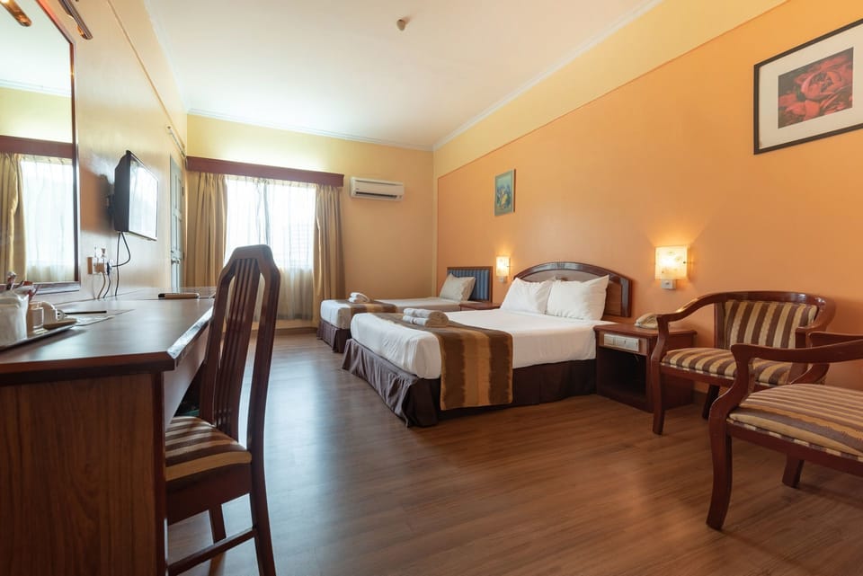 Family Triple Room | Iron/ironing board, free WiFi, bed sheets