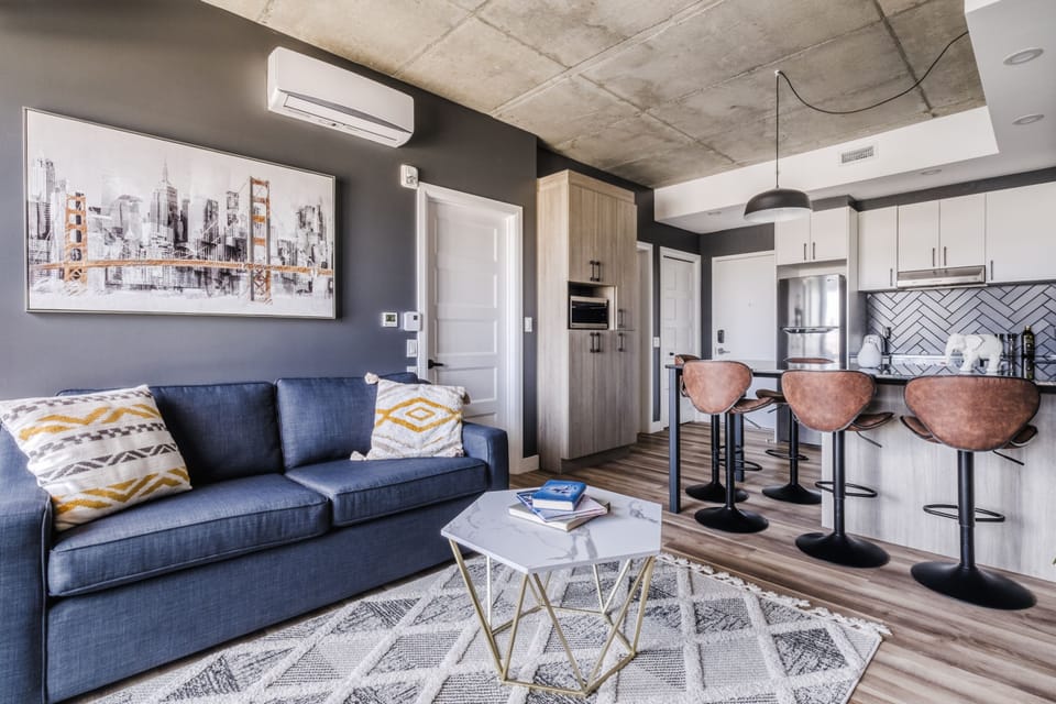 Deluxe Apartment | Living room | 65-inch Smart TV with digital channels, TV, Netflix