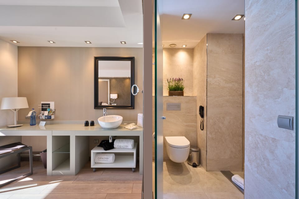Eco-friendly toiletries, hair dryer, towels, soap