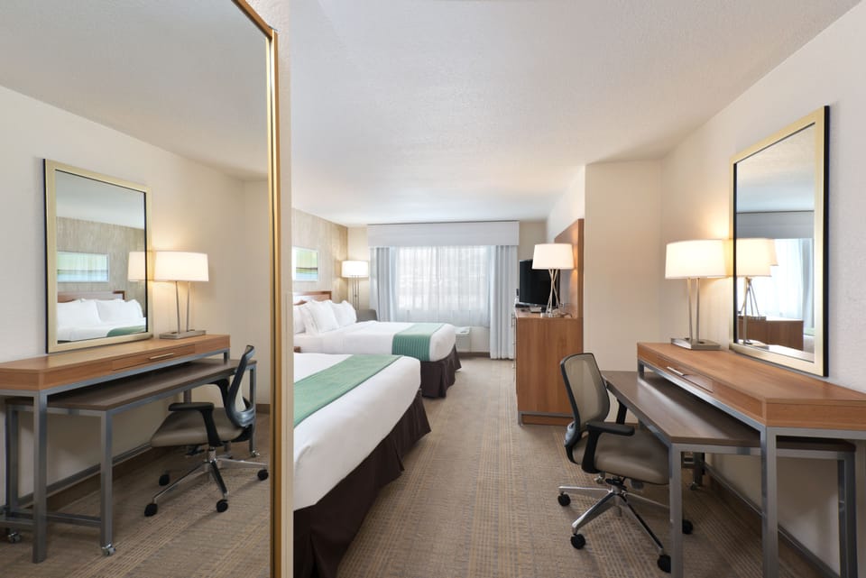 Premium bedding, pillowtop beds, desk, blackout drapes