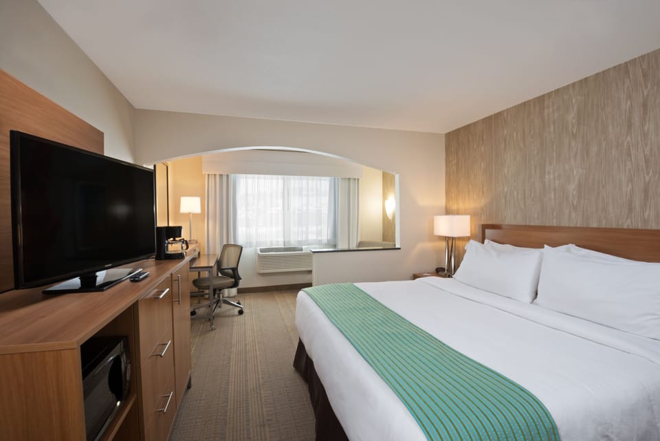 Premium bedding, pillowtop beds, desk, blackout drapes