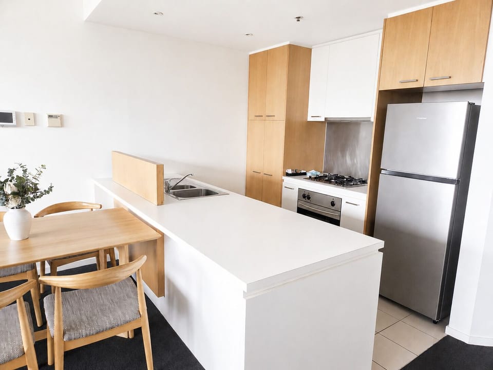 Deluxe Two Bedroom Apartment  | Private kitchen | Full-size fridge, microwave, oven, stovetop