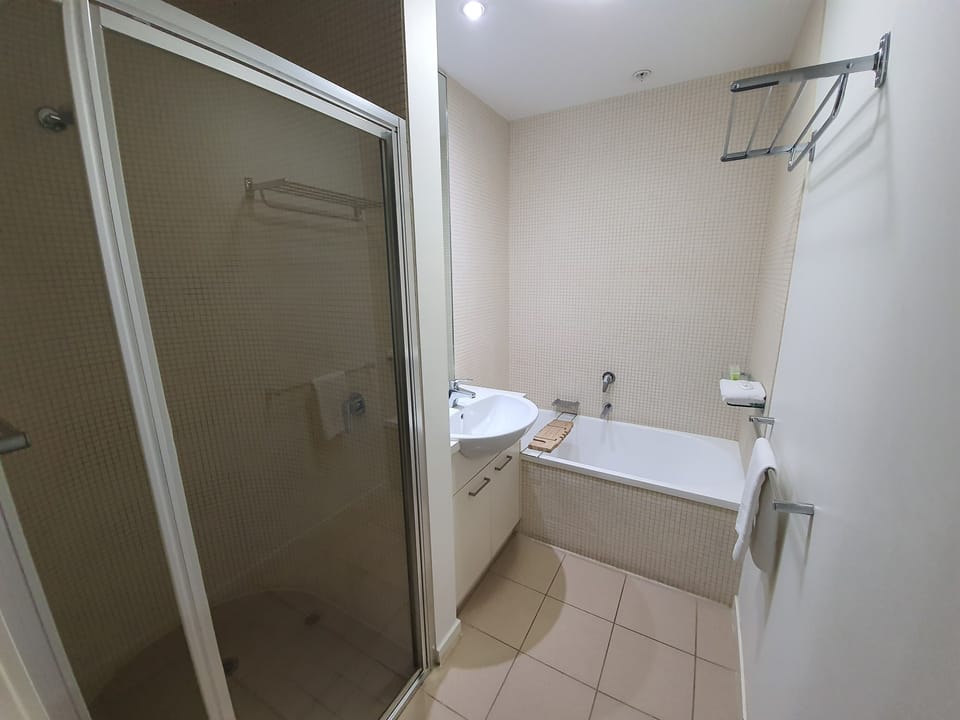 Two Bedroom Apartment | Bathroom | Separate tub and shower, free toiletries, hair dryer, towels