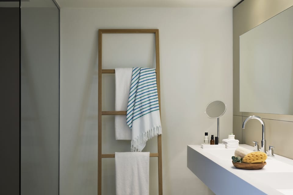 Separate tub and shower, jetted tub, rainfall showerhead