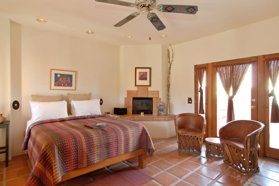 Mesquite Superior Queen Room with Fireplace | Premium bedding, individually decorated, individually furnished