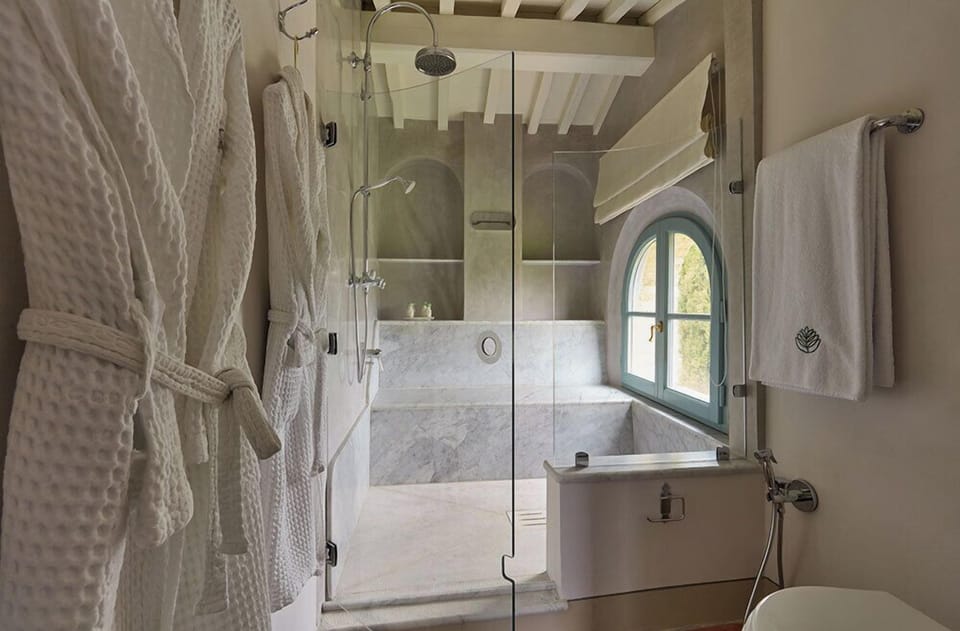 Villa Poggiarello | Bathroom | Eco-friendly toiletries, hair dryer, bathrobes, slippers