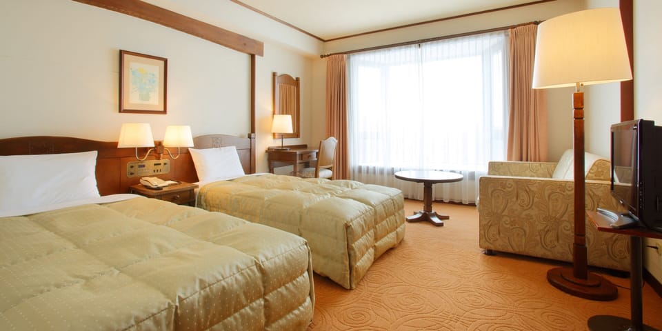 Standard Twin Room, Non Smoking | Down comforters, desk, free WiFi, bed sheets