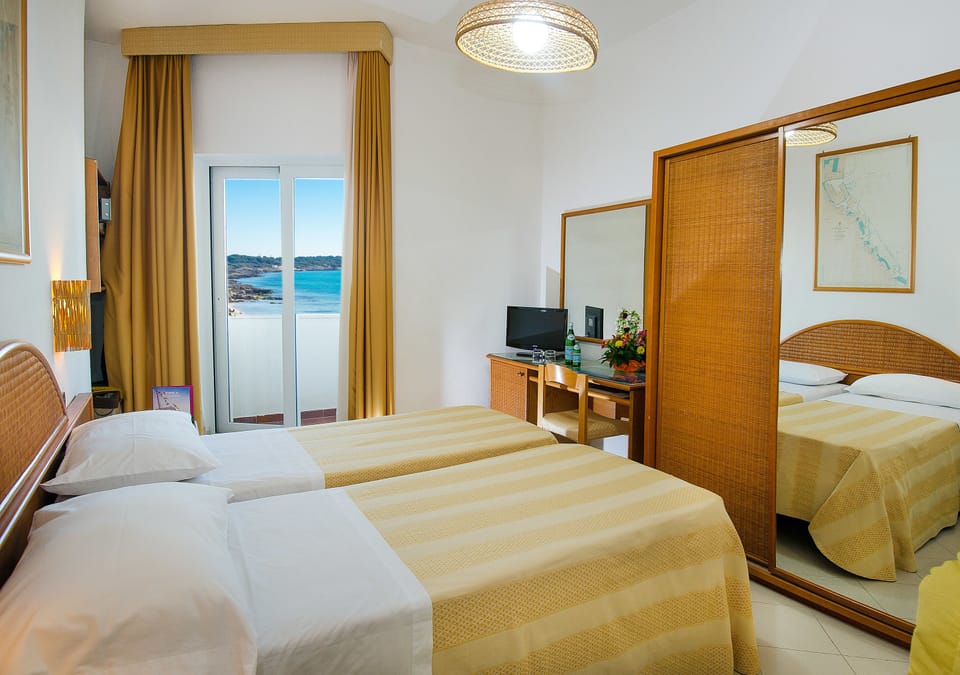 Standard Double or Twin Room | Minibar, in-room safe, desk, blackout drapes