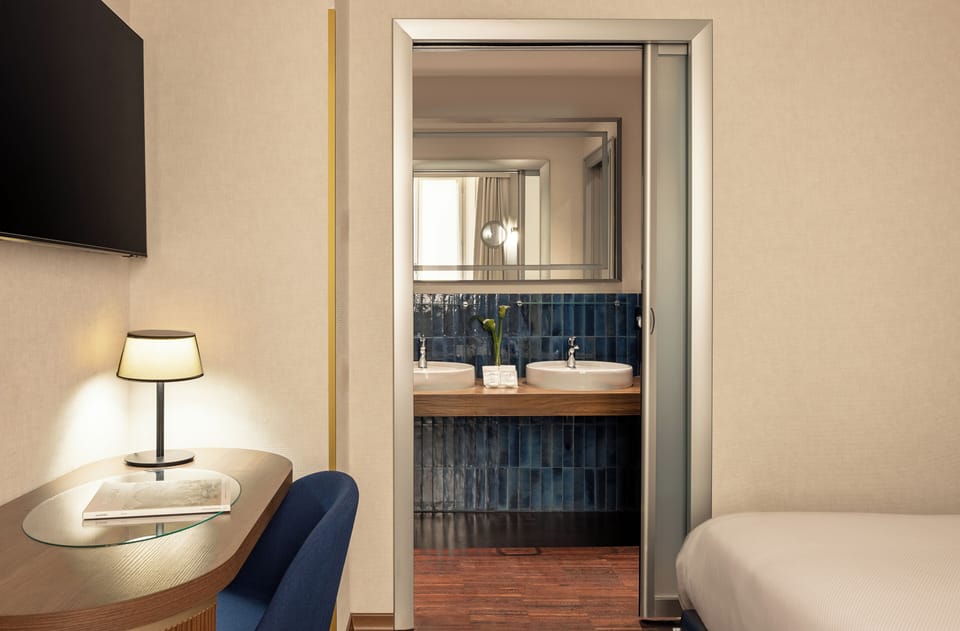 Premium bedding, down comforters, minibar, in-room safe