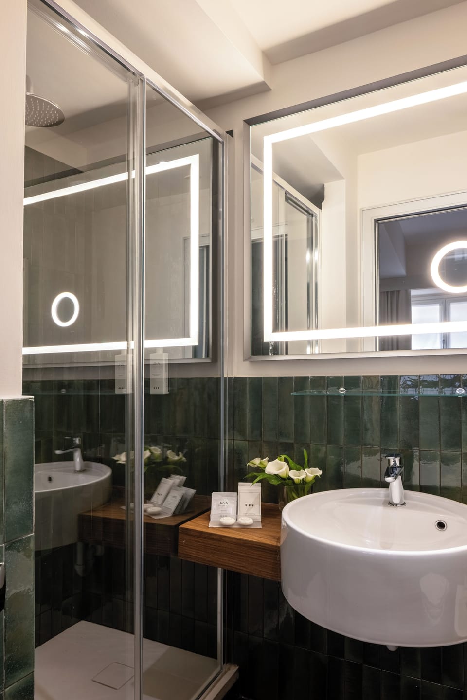 Family Room | Bathroom | Shower, designer toiletries, hair dryer, bathrobes