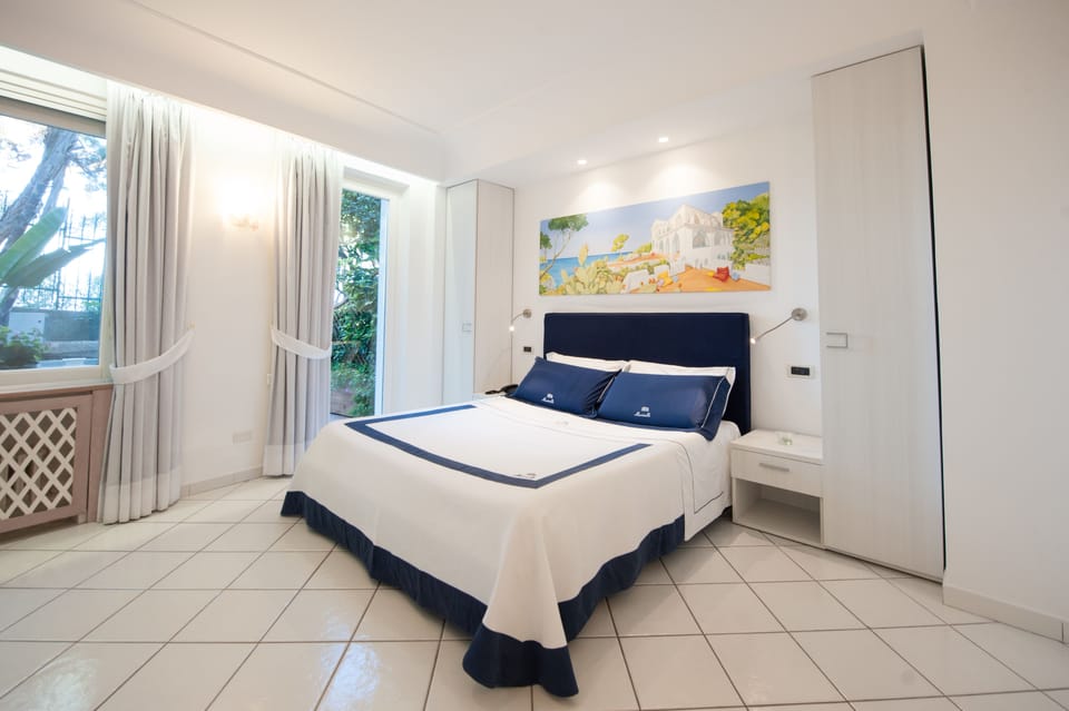 Family Apartment, 1 Bedroom, Kitchenette, Garden View | Premium bedding, minibar, in-room safe, soundproofing
