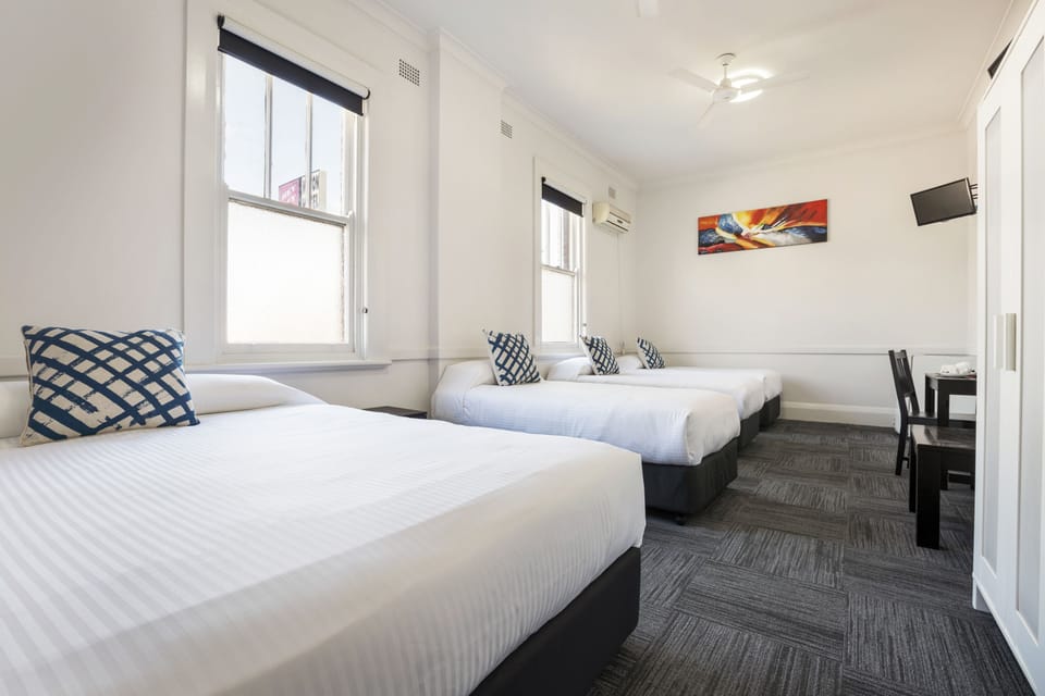 Family Room, Shared Bathroom | Desk, free WiFi, bed sheets