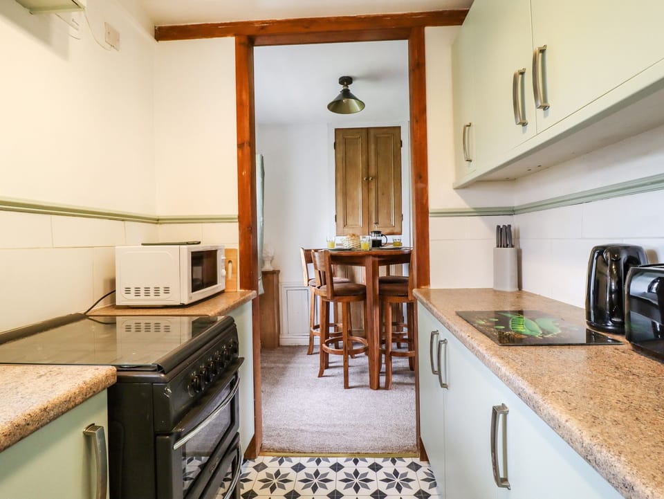 Fridge, electric kettle, toaster, cookware/dishes/utensils