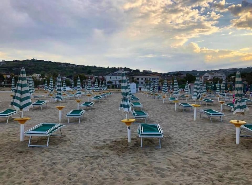 Private beach, sun loungers, beach umbrellas