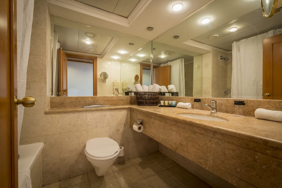 Gefen Mount Meron Room (Classic Wing) | Bathroom | Shower, hair dryer, bathrobes, slippers