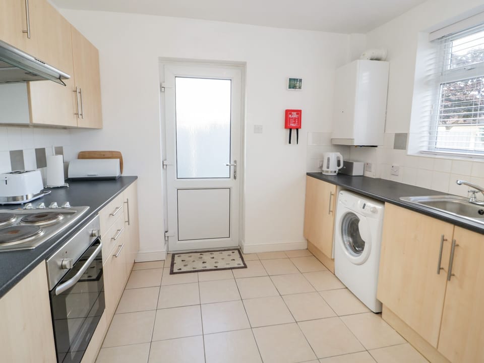 Fridge, electric kettle, toaster, cookware/dishes/utensils