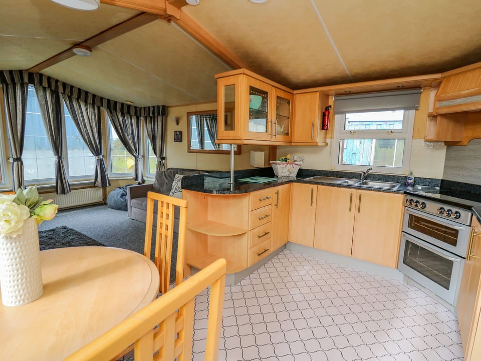 Fridge, electric kettle, toaster, cookware/dishes/utensils