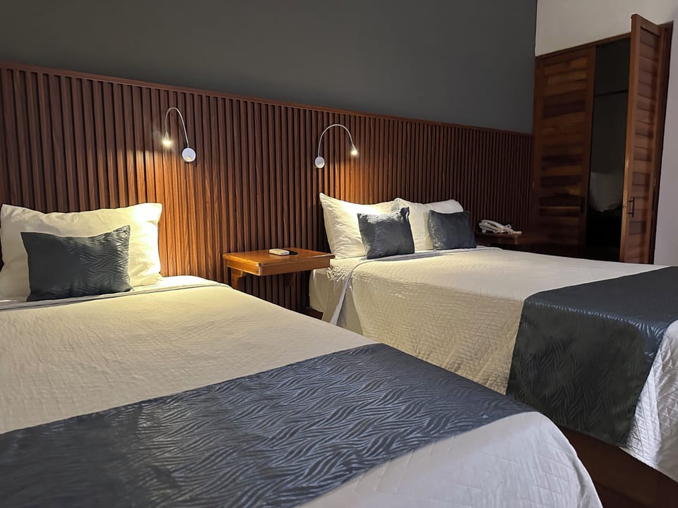 Basic Room, Multiple Beds | Down comforters, memory foam beds, desk, laptop workspace
