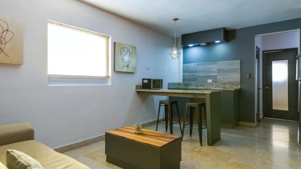 Senior Suite, Kitchen | Private kitchen | Full-size fridge, microwave, stovetop, cookware/dishes/utensils