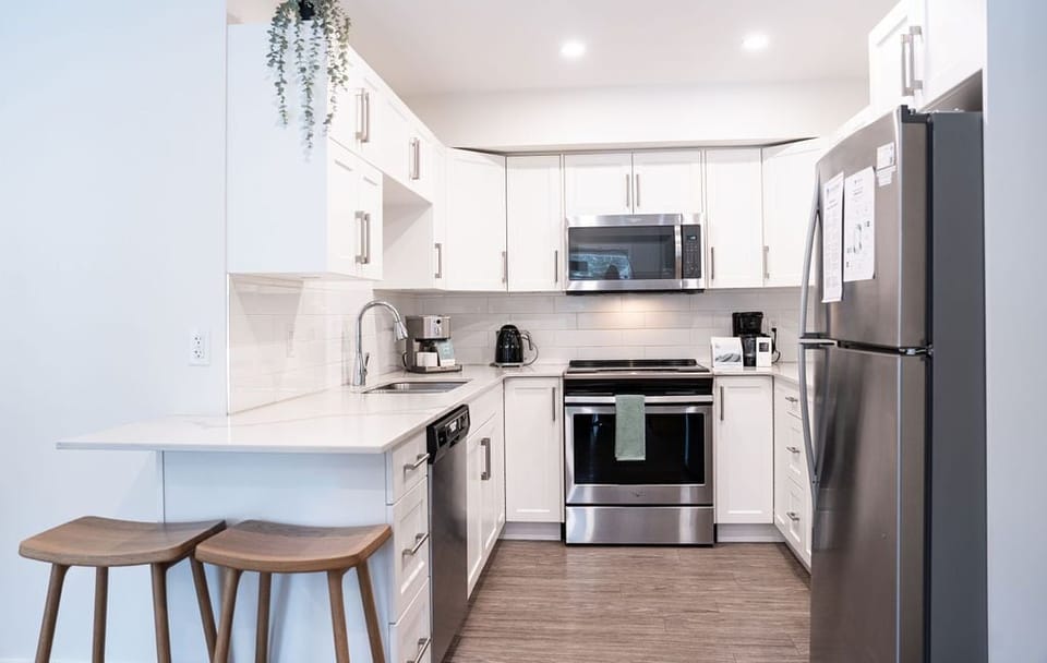 Powder Village Retreat | Private kitchen | Coffee/tea maker, full-size fridge, microwave, oven