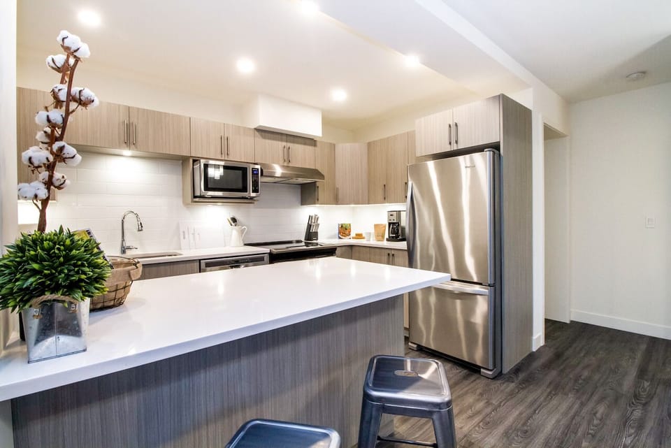Revelstoke Retreat | Private kitchen | Coffee/tea maker, full-size fridge, microwave, oven