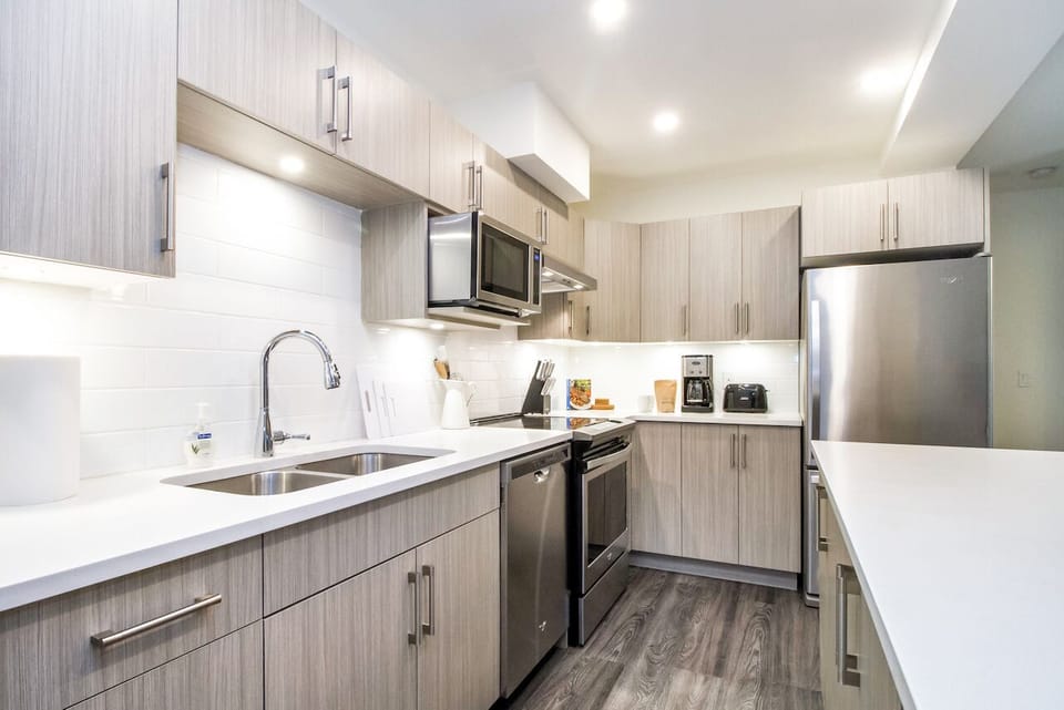 Revelstoke Retreat | Private kitchen | Coffee/tea maker, full-size fridge, microwave, oven