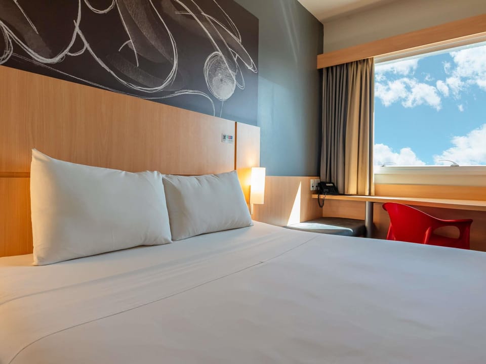 Standard Apartment, 1 Double Bed | Minibar, in-room safe, desk, blackout drapes