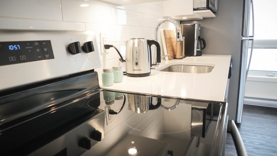 The Revy Den | Private kitchen | Coffee/tea maker, full-size fridge, microwave, oven