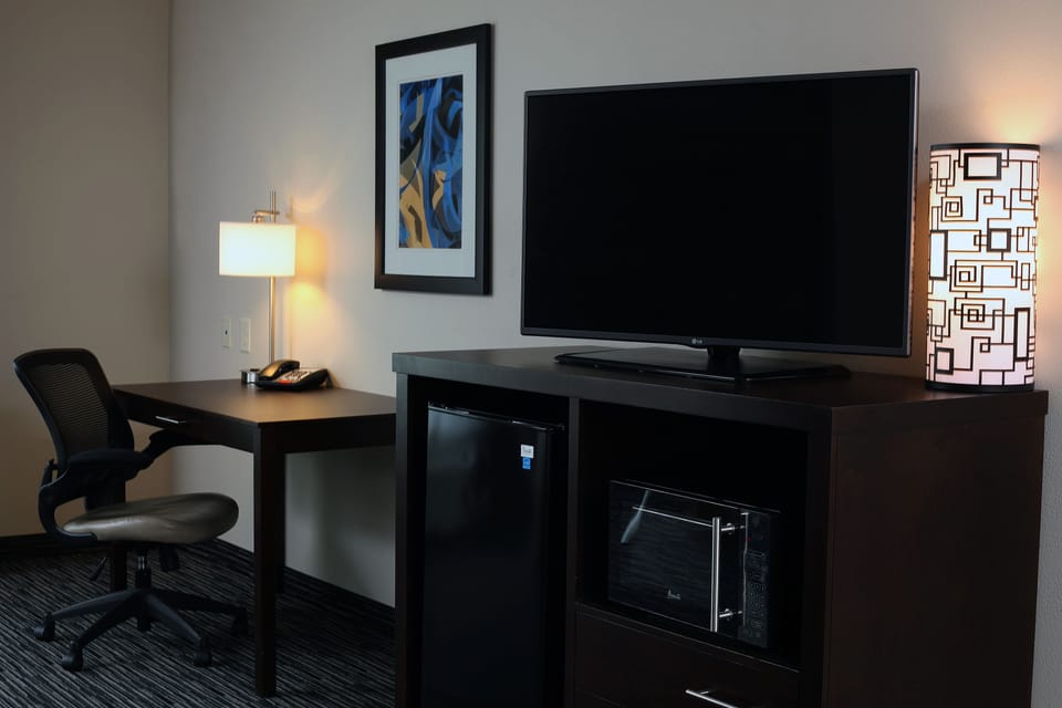 Premium bedding, down comforters, desk, laptop workspace