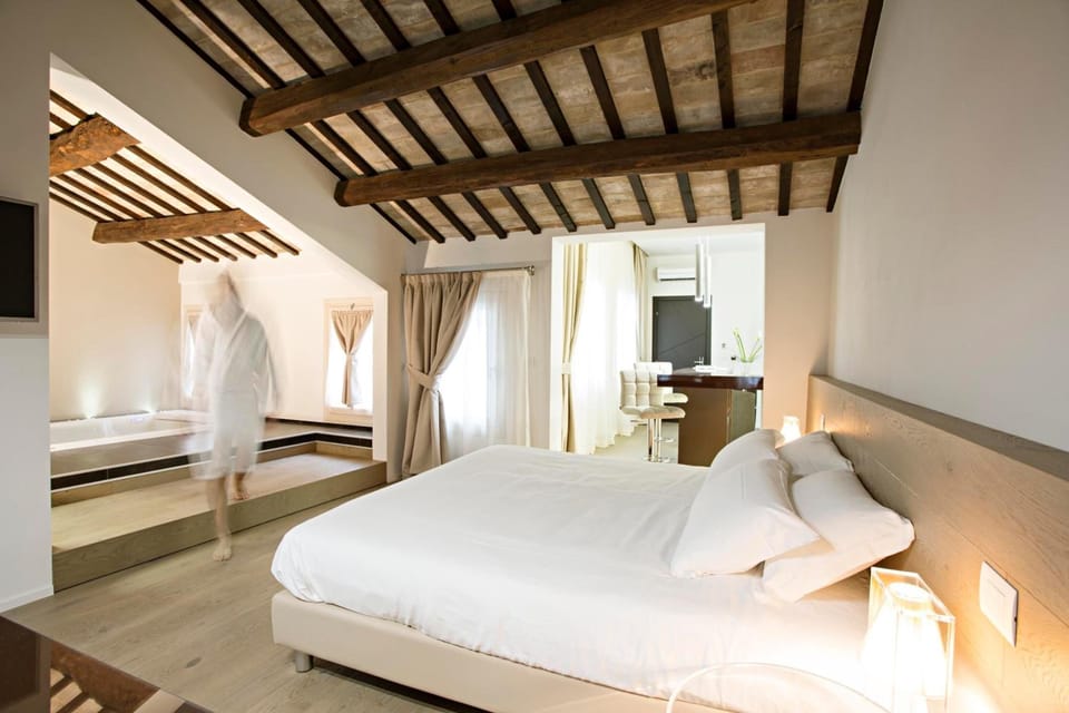 Premium bedding, down comforters, memory foam beds, minibar