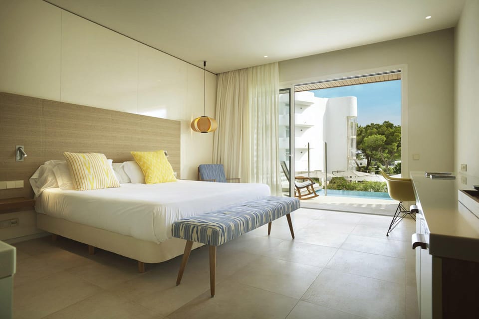 Junior Suite, Private Pool | Minibar, in-room safe, desk, blackout drapes