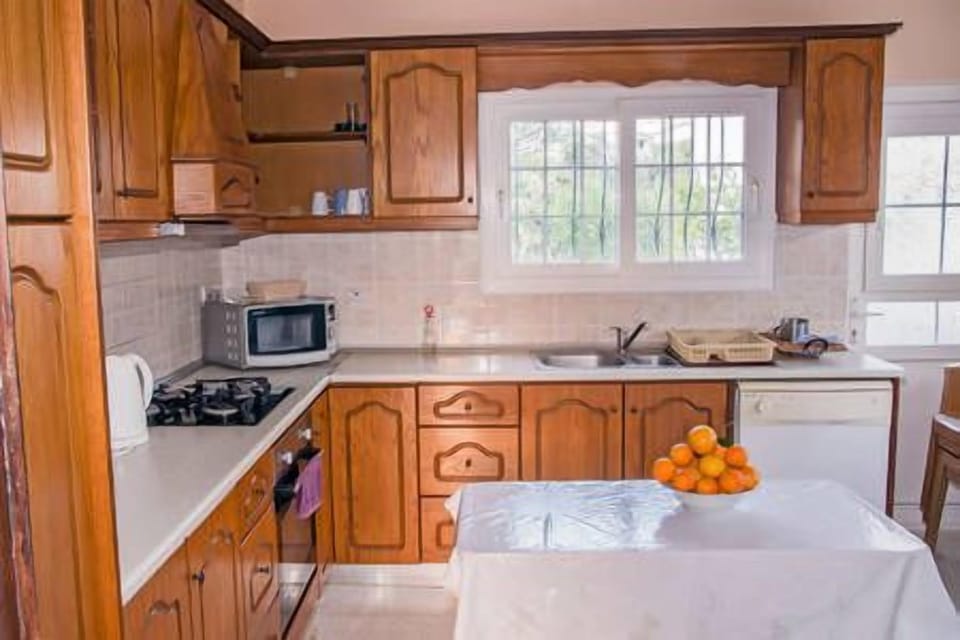 Villa | Private kitchen | Fridge, microwave, oven, stovetop