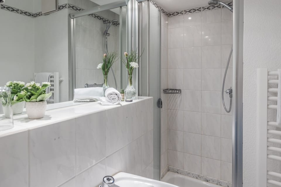 Bathtub, hair dryer, towels